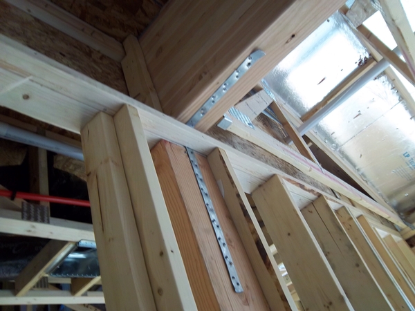 Improper Installation of Post to Beam Strap Improper Installation of Post to Beam Strap